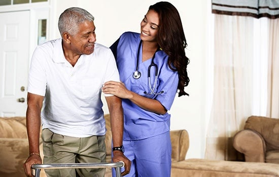 Health Care Worker and Elderly Man