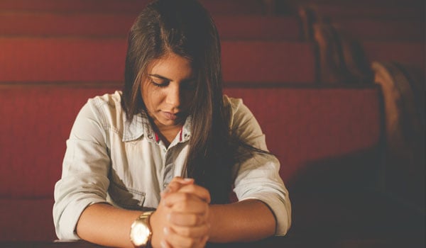 Girl Praying In Church