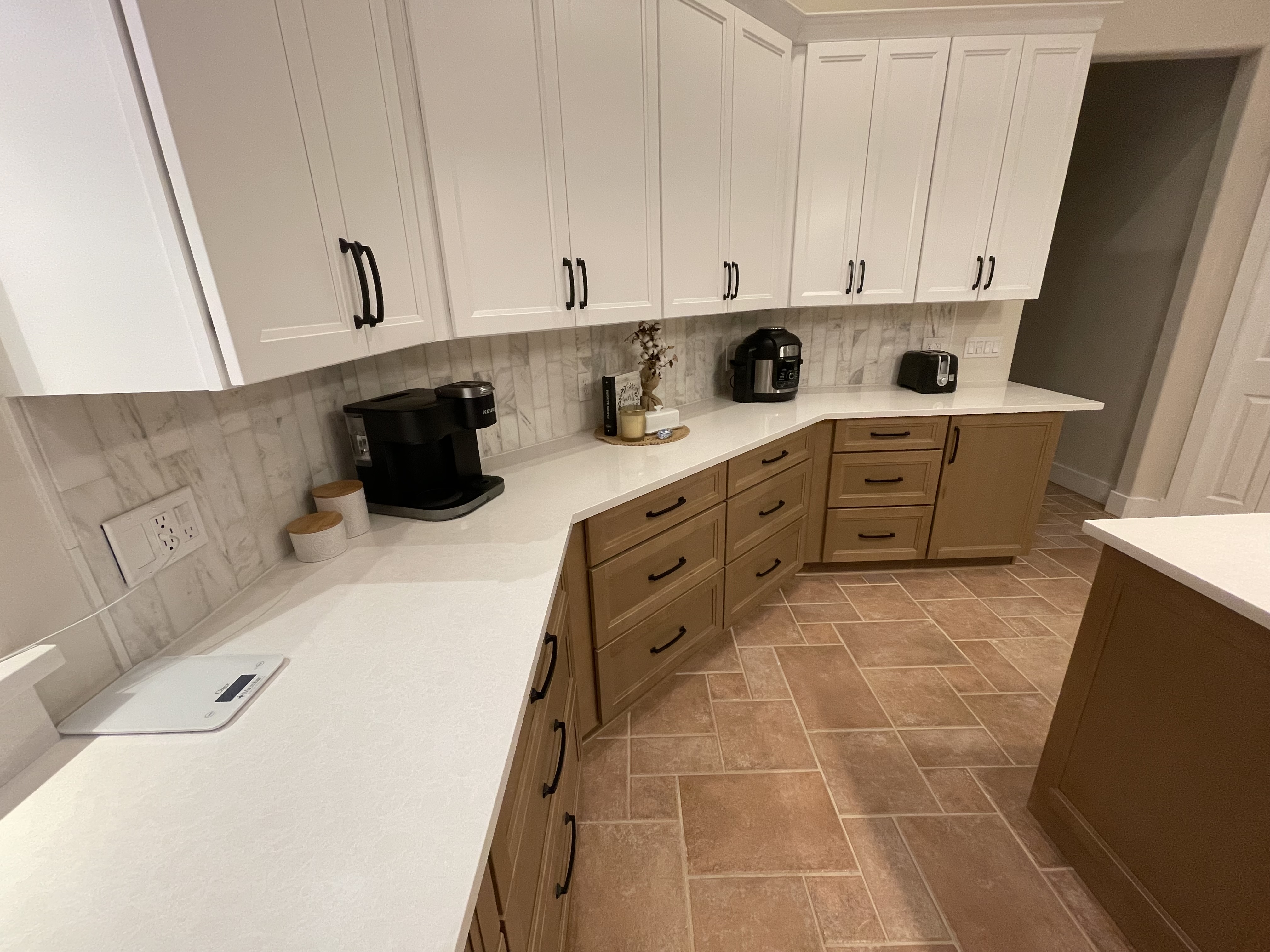 Massive countertops featuring versatile Cambria Newport quartz.