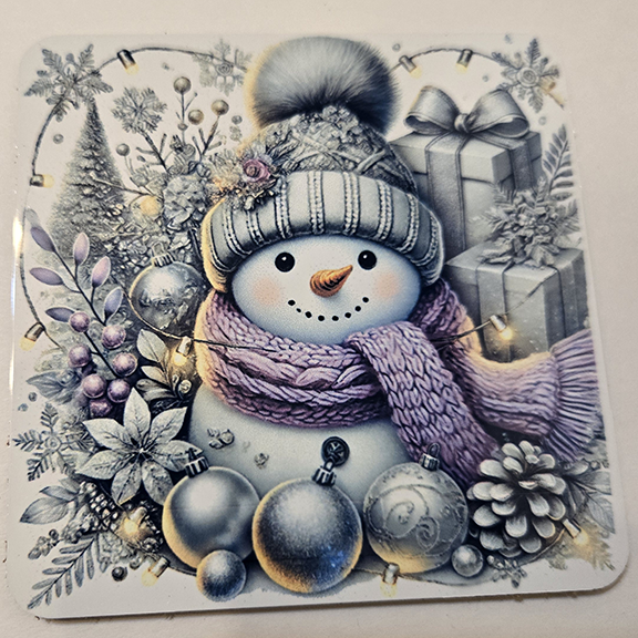 Square metal coaster with a snowman design