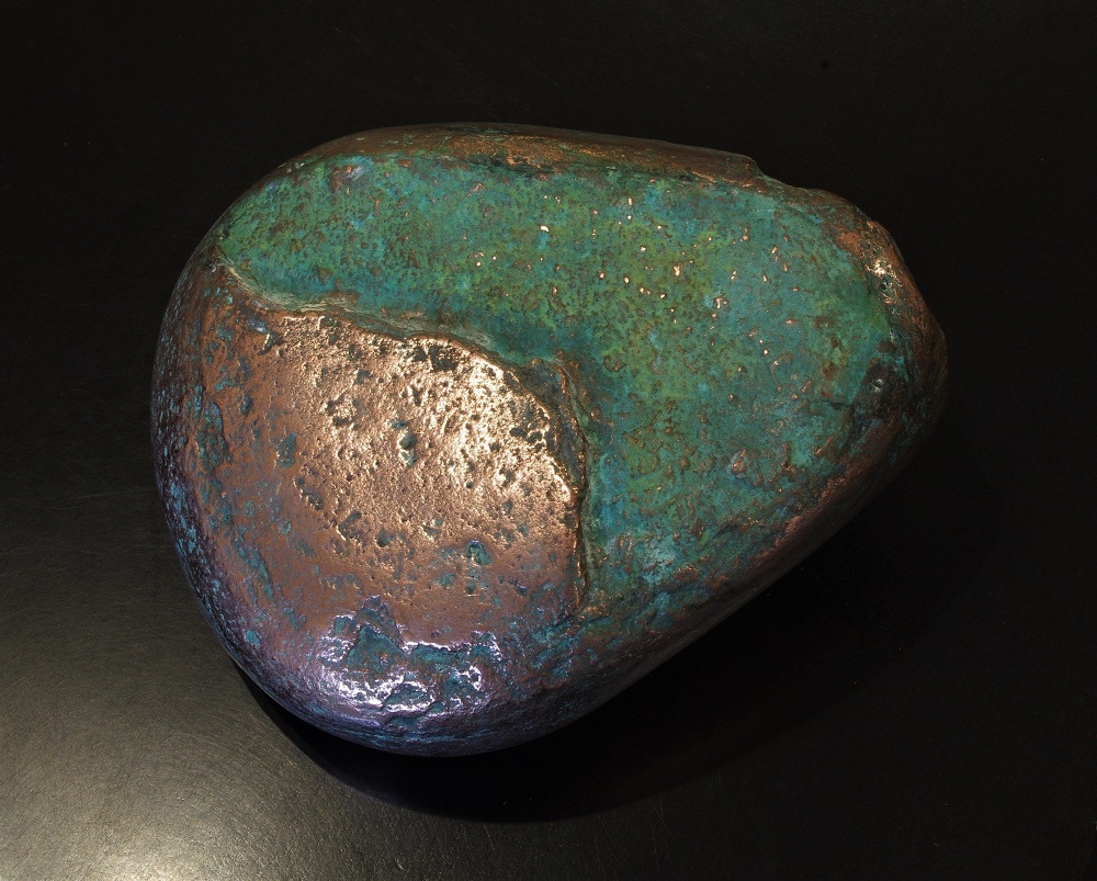 Verdigris Finish with copper applied to a pebble by Artistic Metals