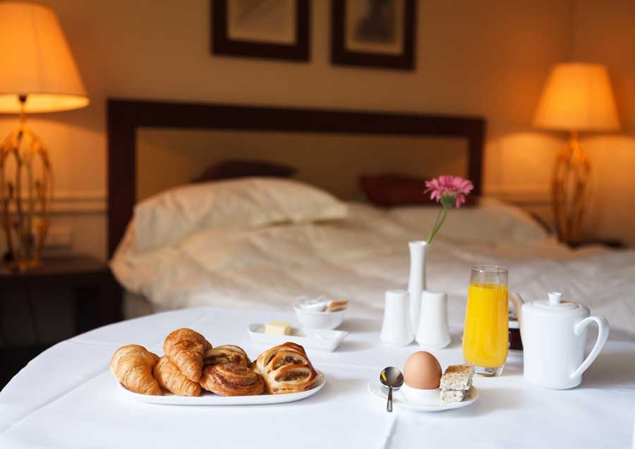 Woman in white clothes doing yoga