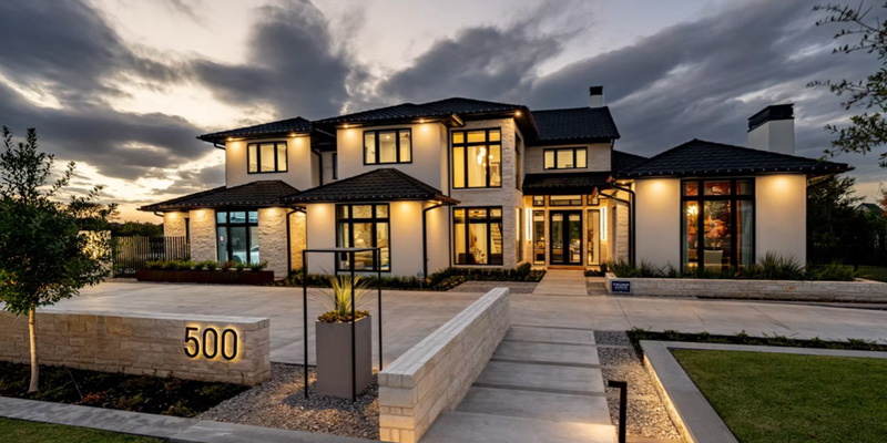 A large home with an address on the front