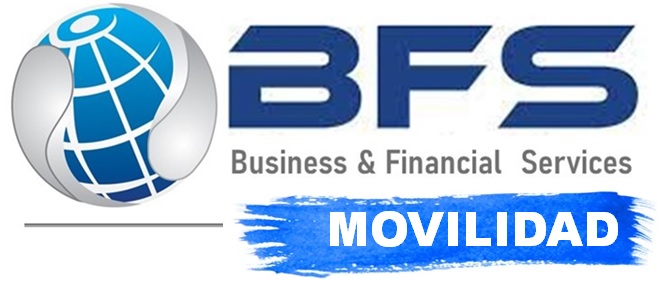 Two businessmen talking and looking at laptop screen