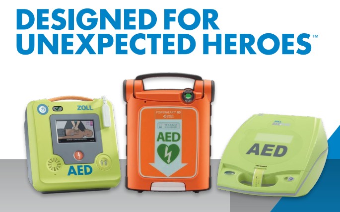 Person receiving chest compressions during CPR training by a person wearing blue gloves.