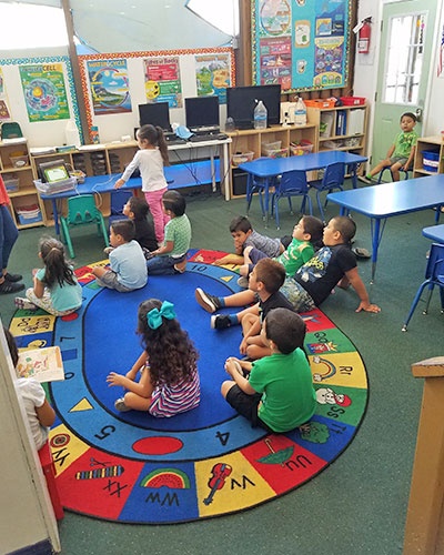 Children Sitting on the Floor