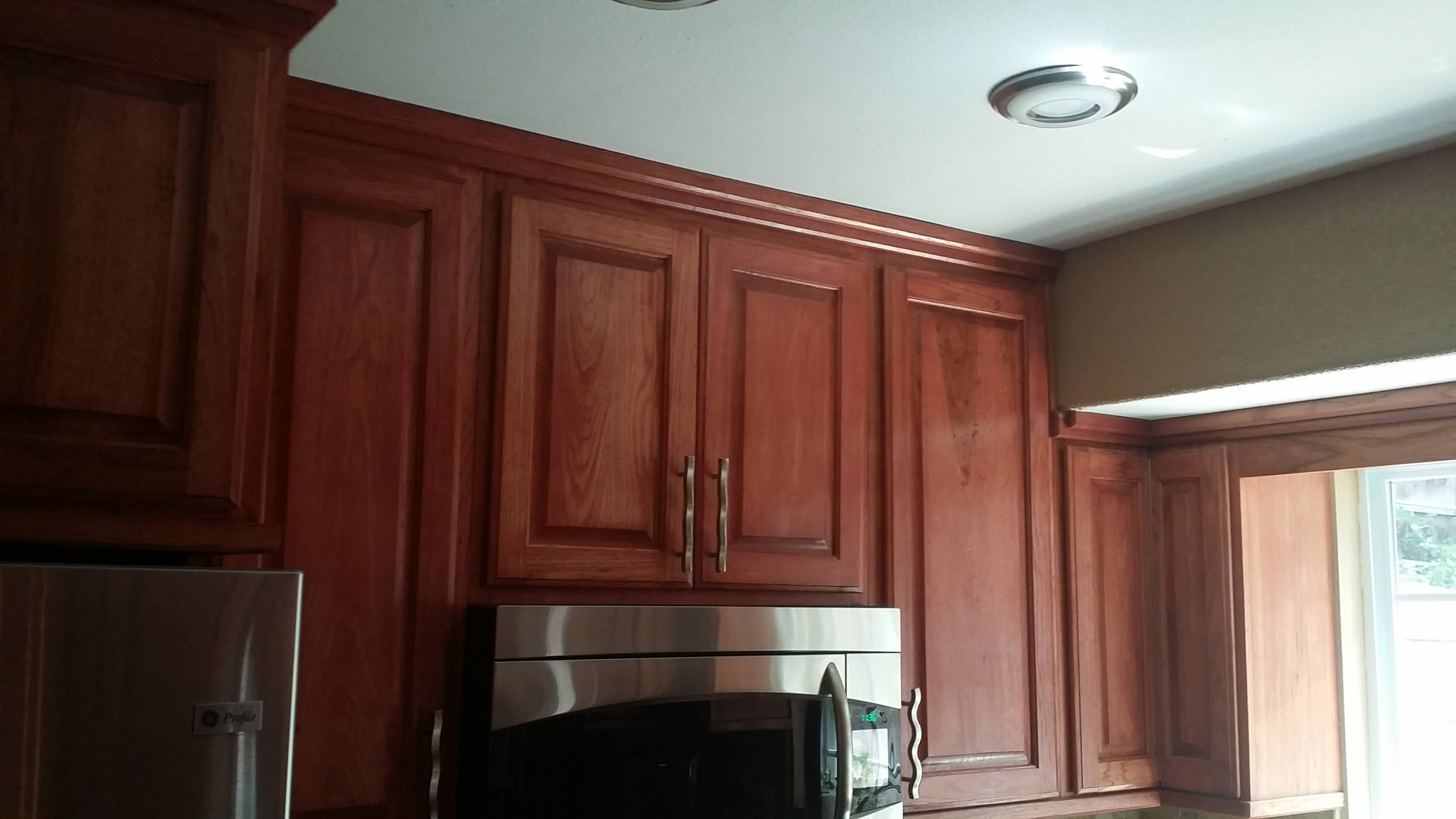 Wall Cabinets feature Sedona Red Hickory
 Raised Panels, soft close door hinges and soft 
close full slide out drawers.