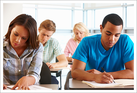 Students writing notes||||