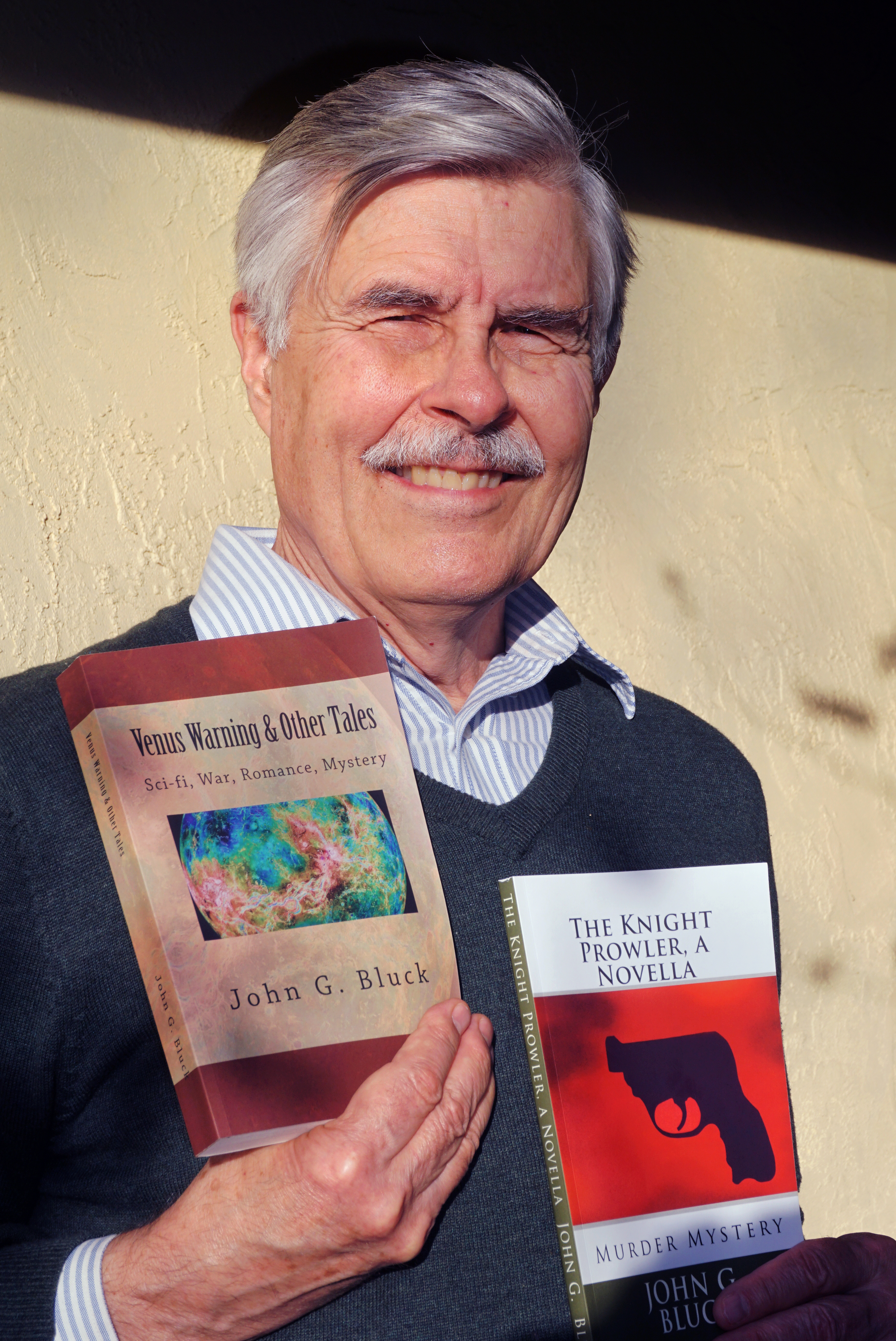 Author John G. Bluck with his book of short stories, "Venus Warning & Other Tales," and his first mystery, "The Knight Prowler, a novella."