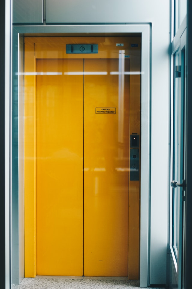 https://0201.nccdn.net/4_2/000/000/04b/787/closed-yellow-elevator-door-407423-640x959.jpg