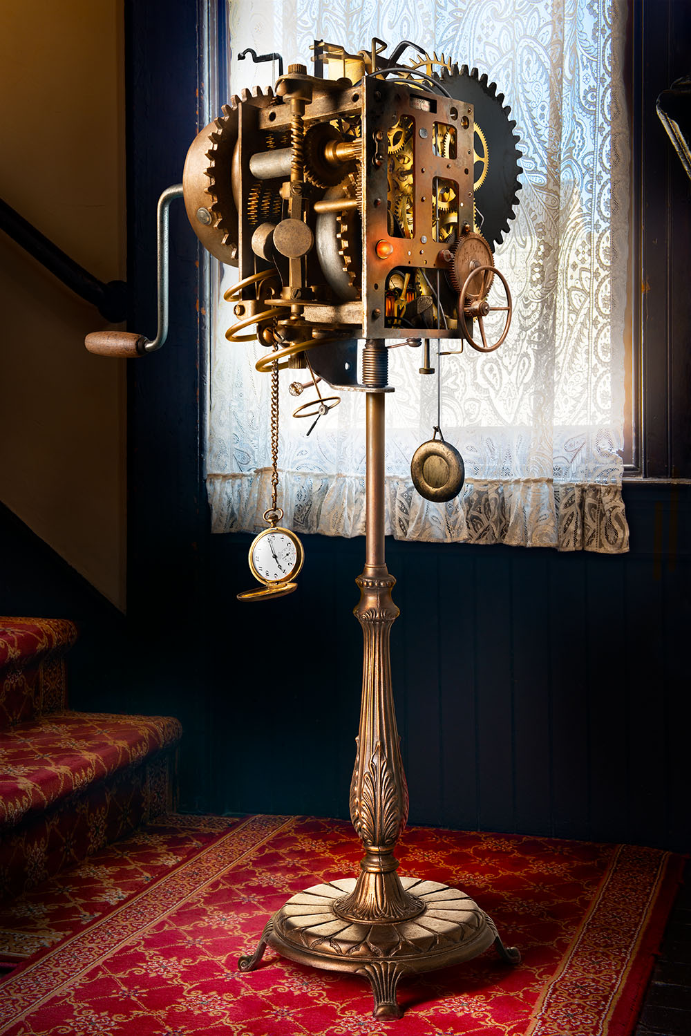 A steampunk machine, comprised of an impossibly complex collection of clockworks, gears, and machine parts, in a victorian room.