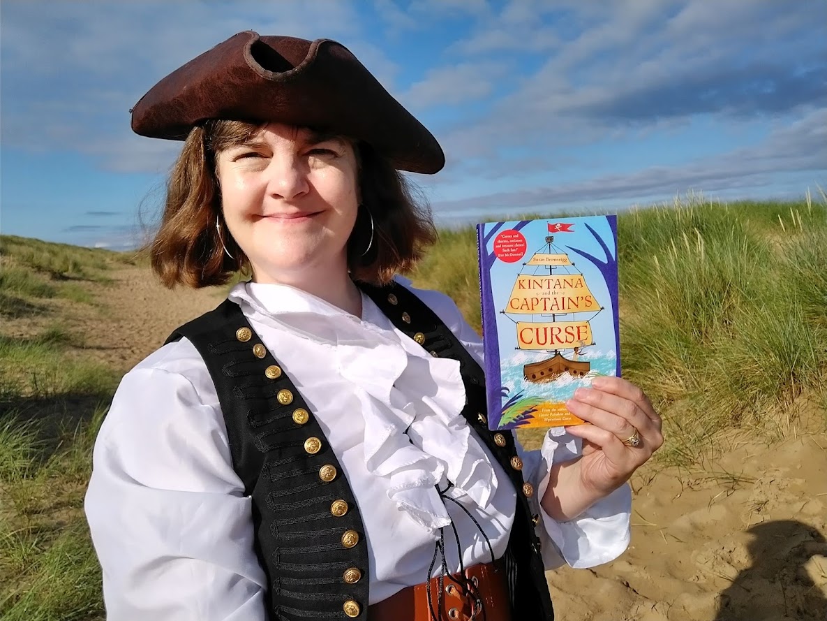 Author Susan Brownrigg with her book Kintana and the Captain's Curse
