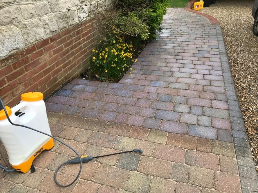 Sealant Being Applied to Block Paving After Re-Sanding