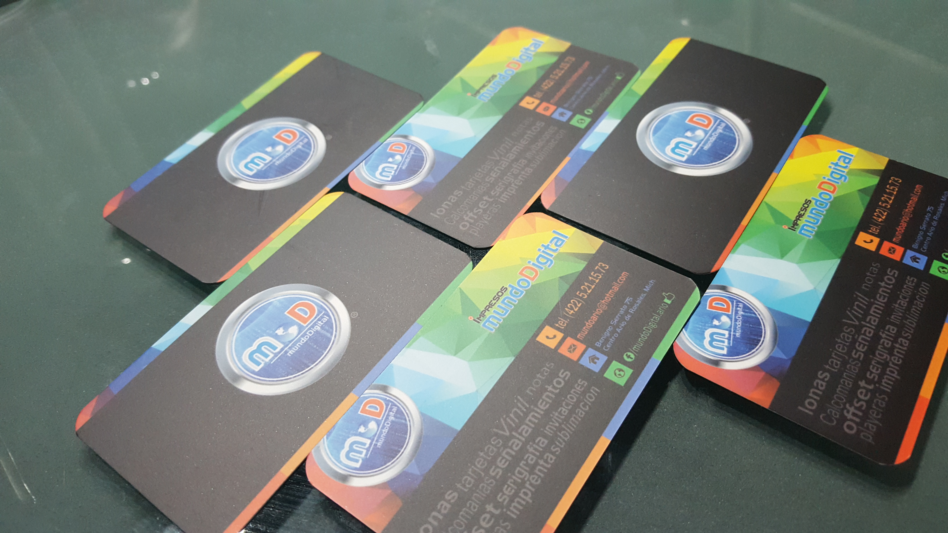 Elderly couple driving a convertible car