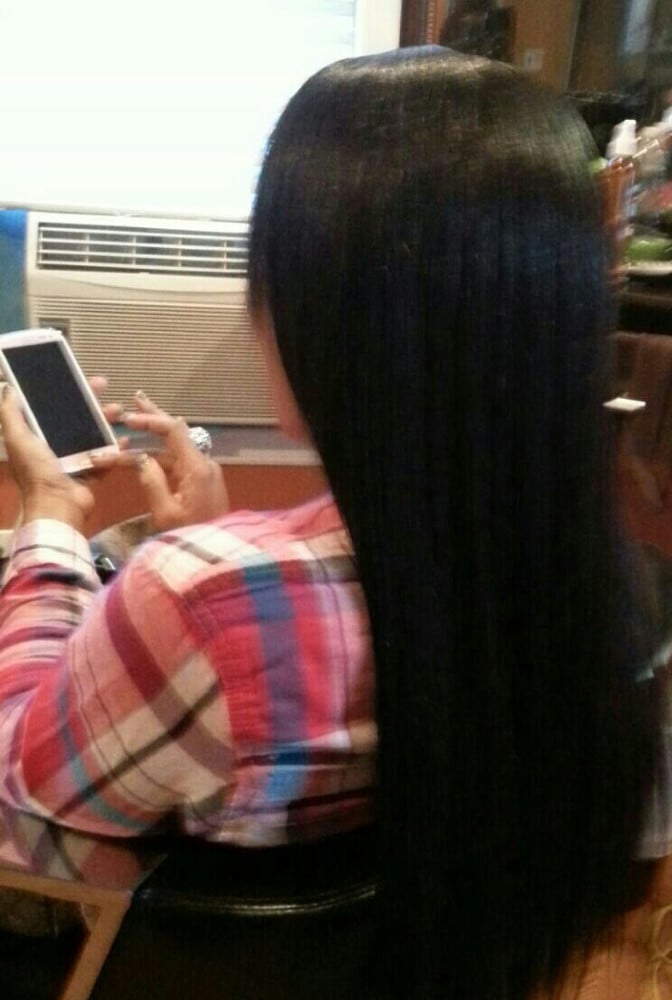 Sew - in  Weave Middle part