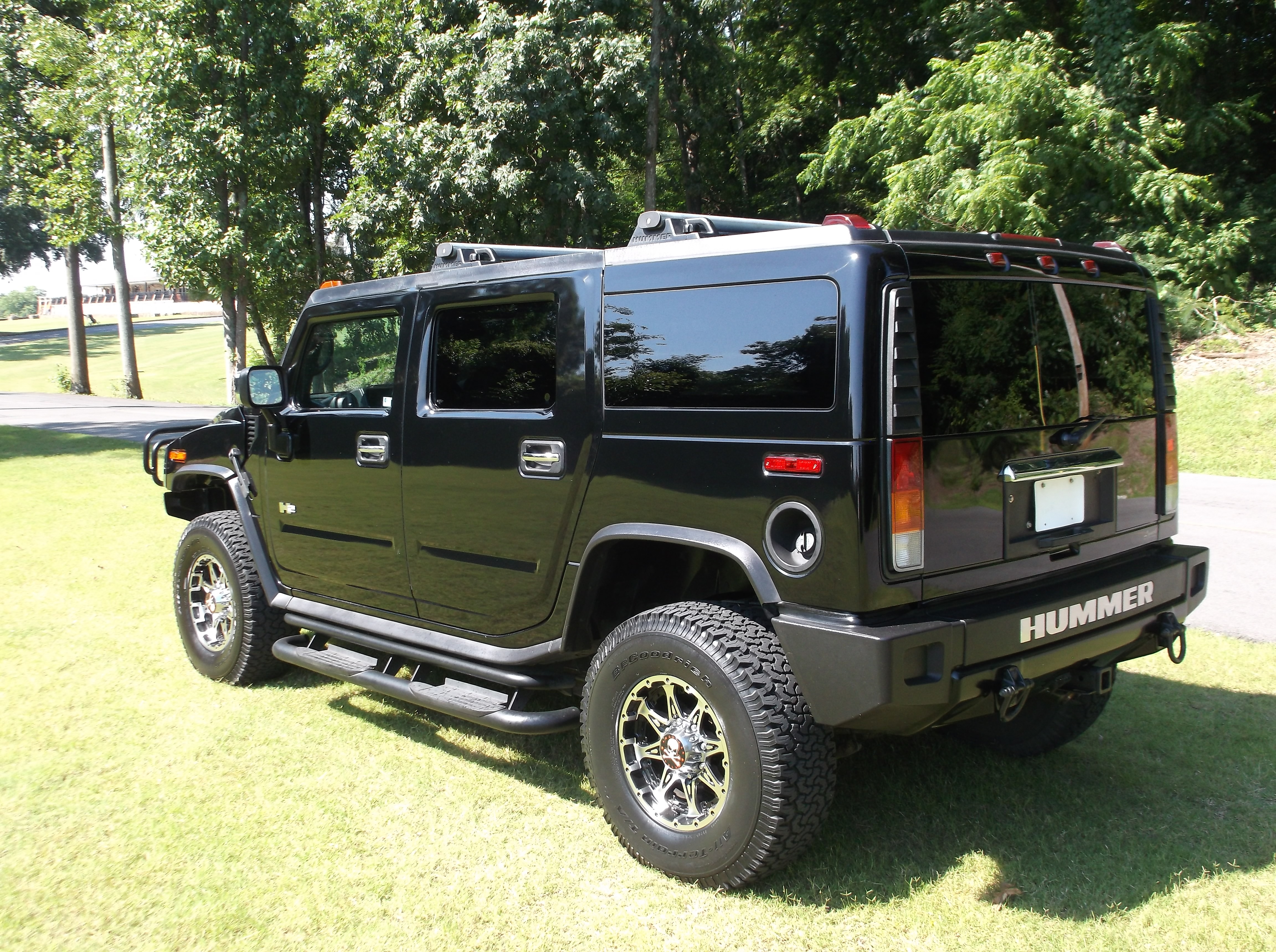 https://0201.nccdn.net/4_2/000/000/04d/e26/2003HummerH2Black_0003-4608x3440.jpg