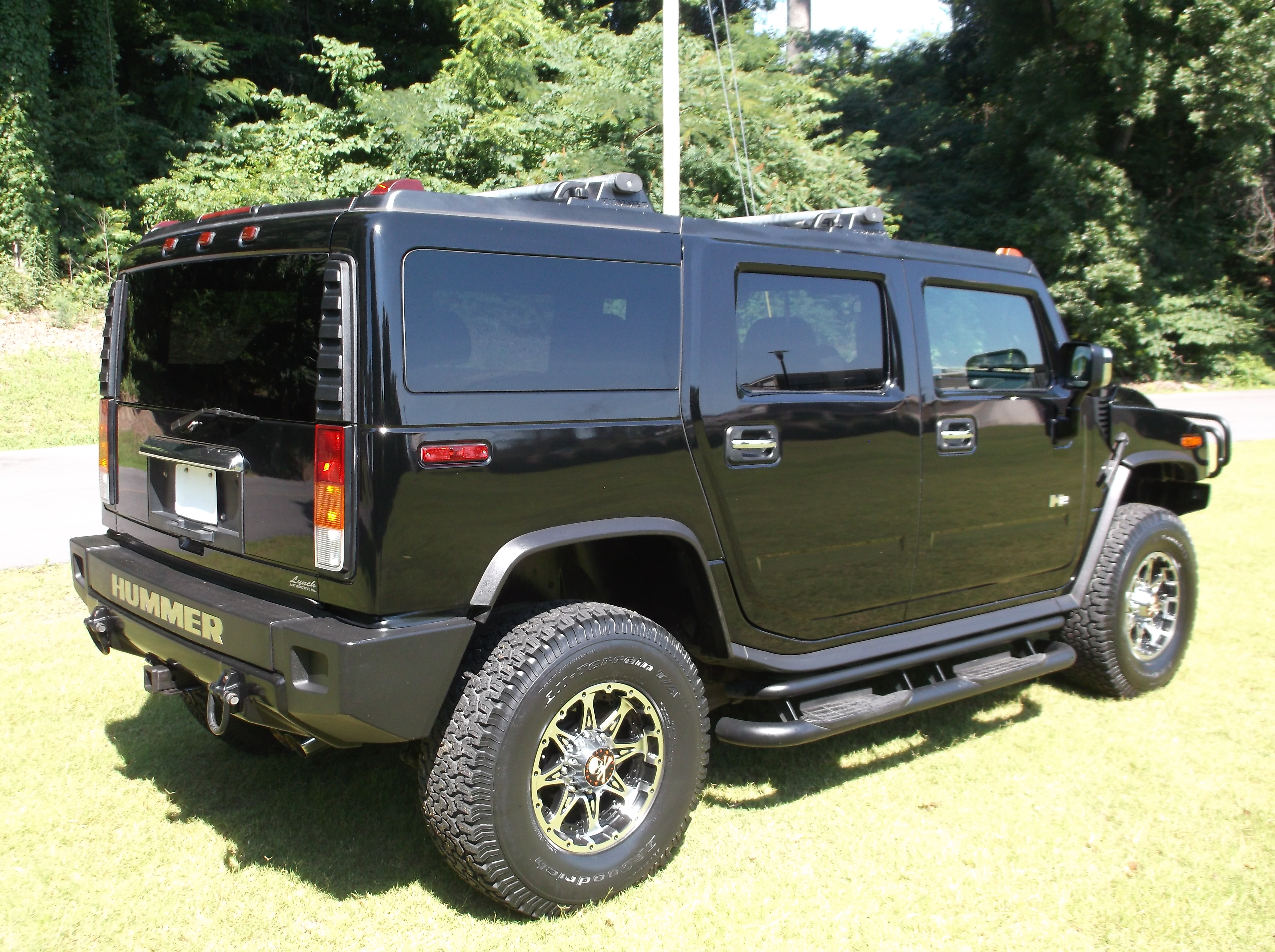 https://0201.nccdn.net/4_2/000/000/050/773/2003HummerH2Black_0082-4608x3440.jpg