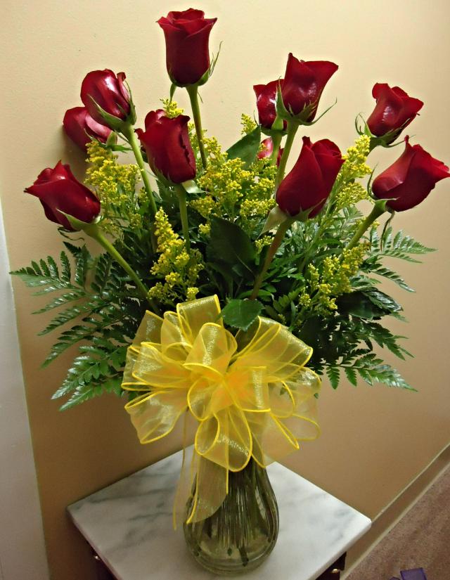 (10) Dozen Red Roses w/ Solidago
$85.00