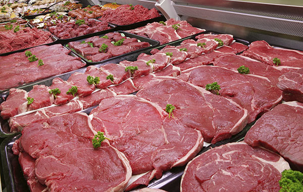 Raw beef in a refrigerated counter Raw beef in a refrigerated counter