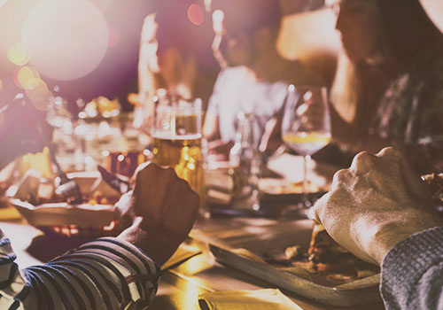 Friends around the table with wine