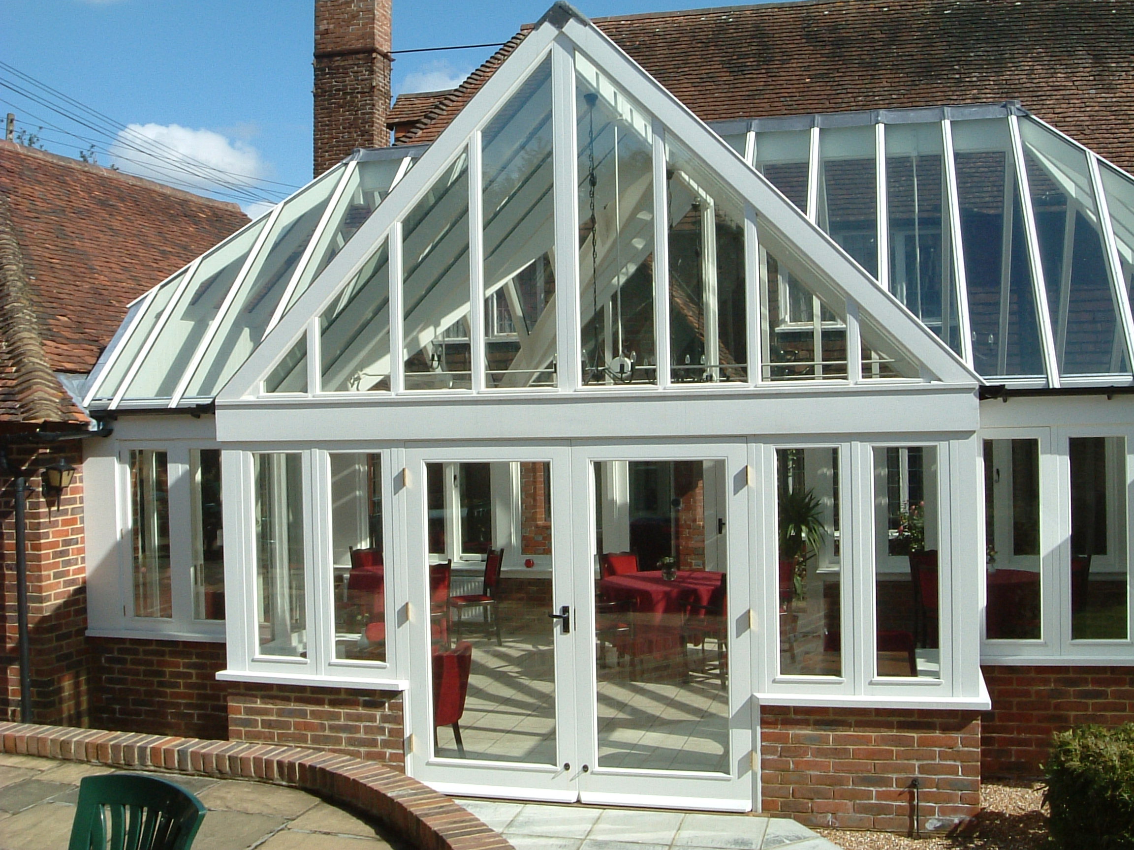 person writing on white paper