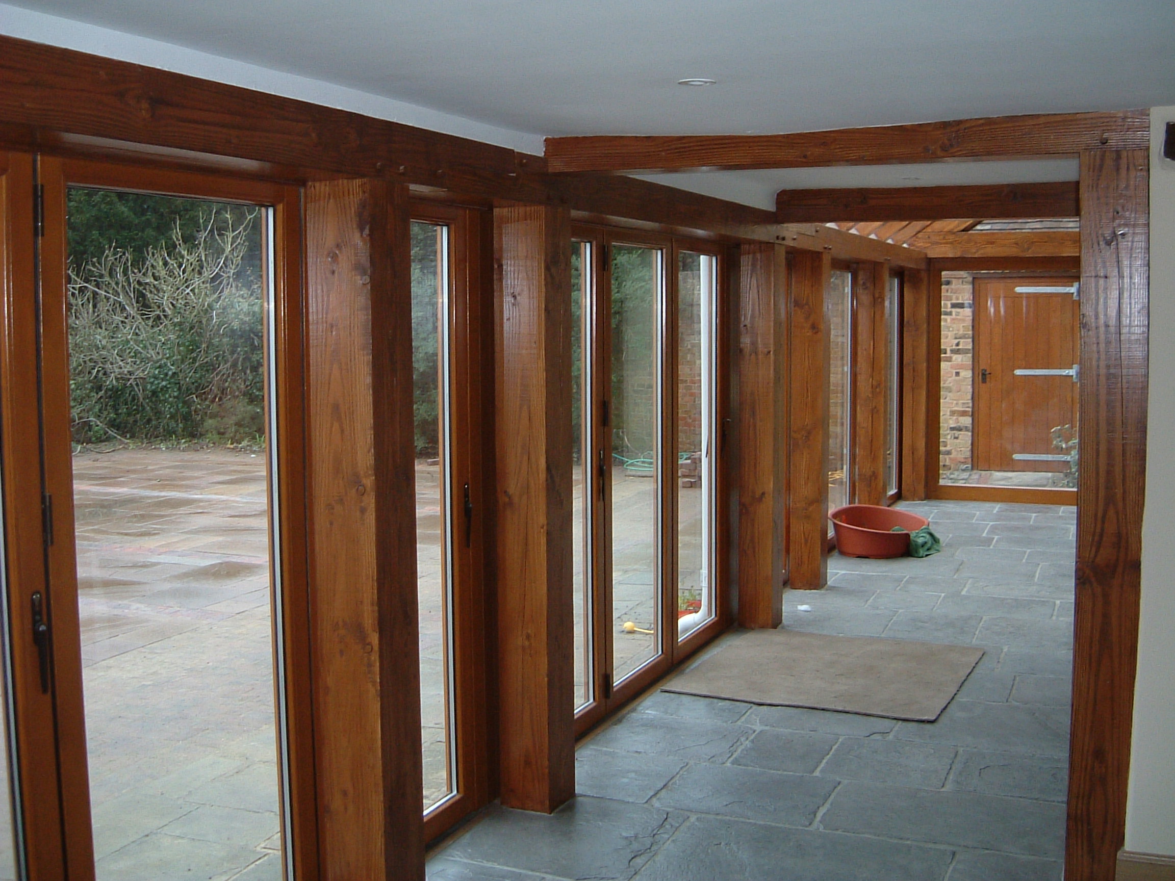 yellow and black marker pen on brown wooden table