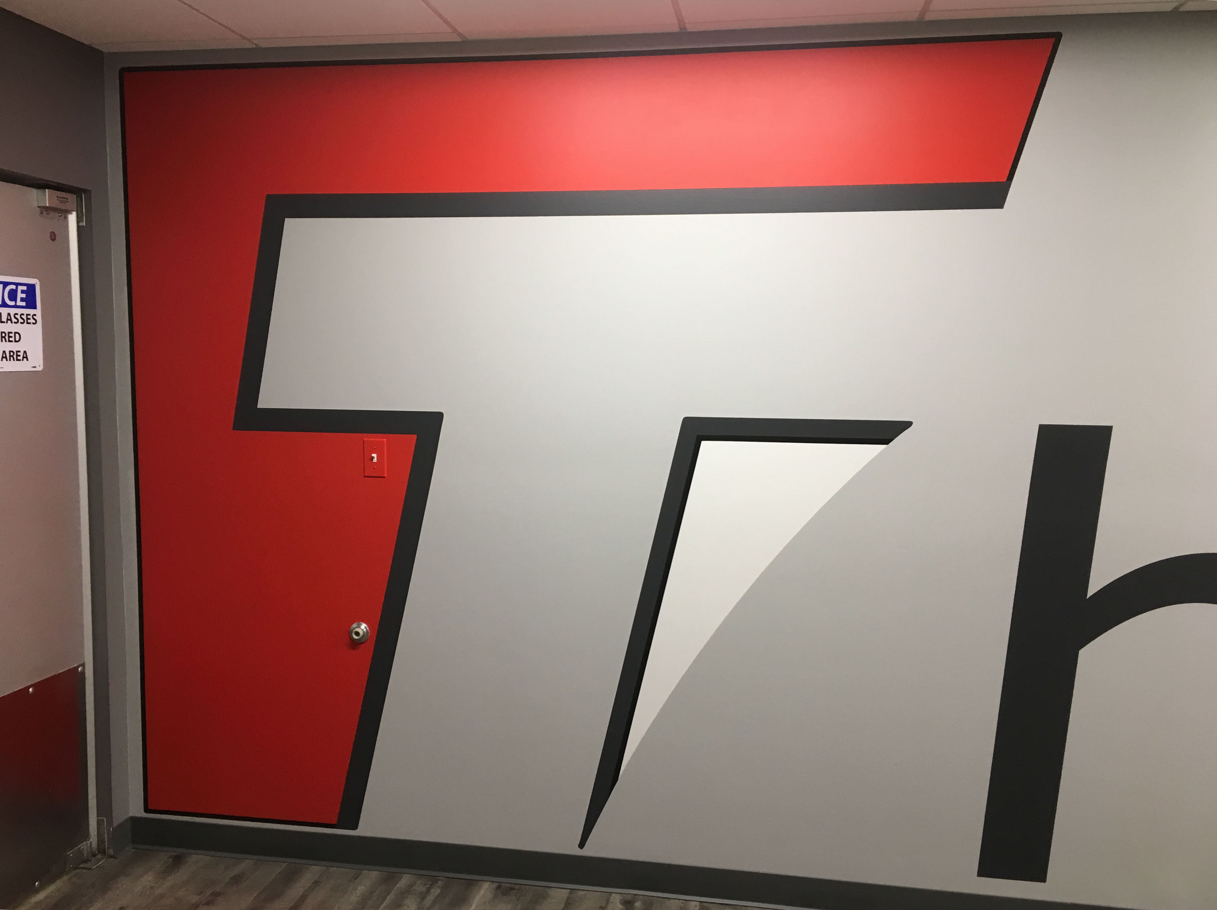 image of large wall graphics painted using paint mask stencils