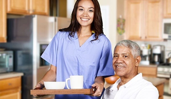 Health Care Worker and Elderly Man