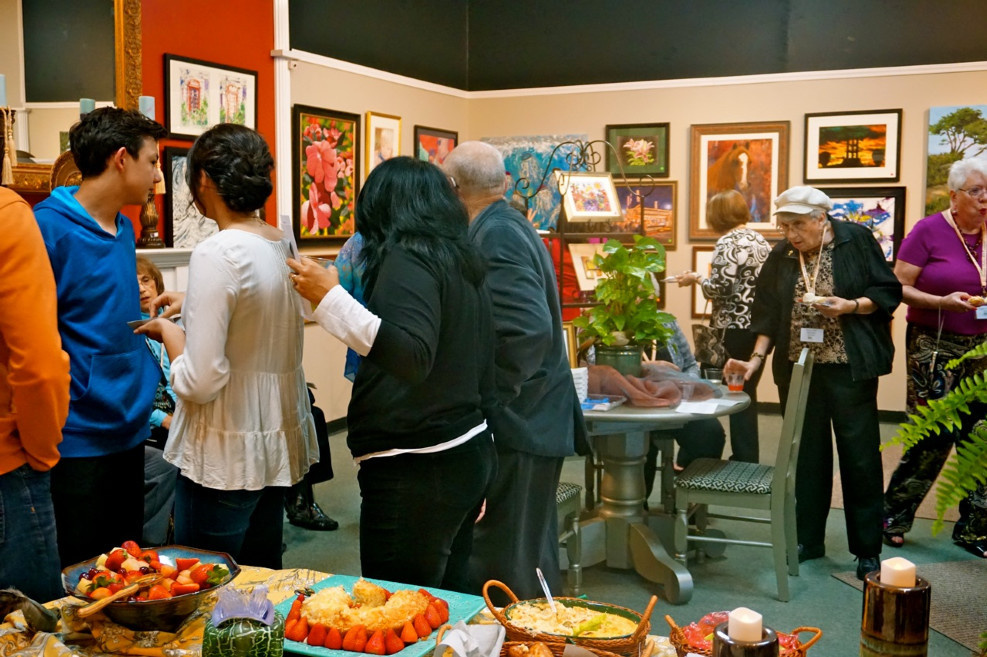 Guests and members enjoying the show