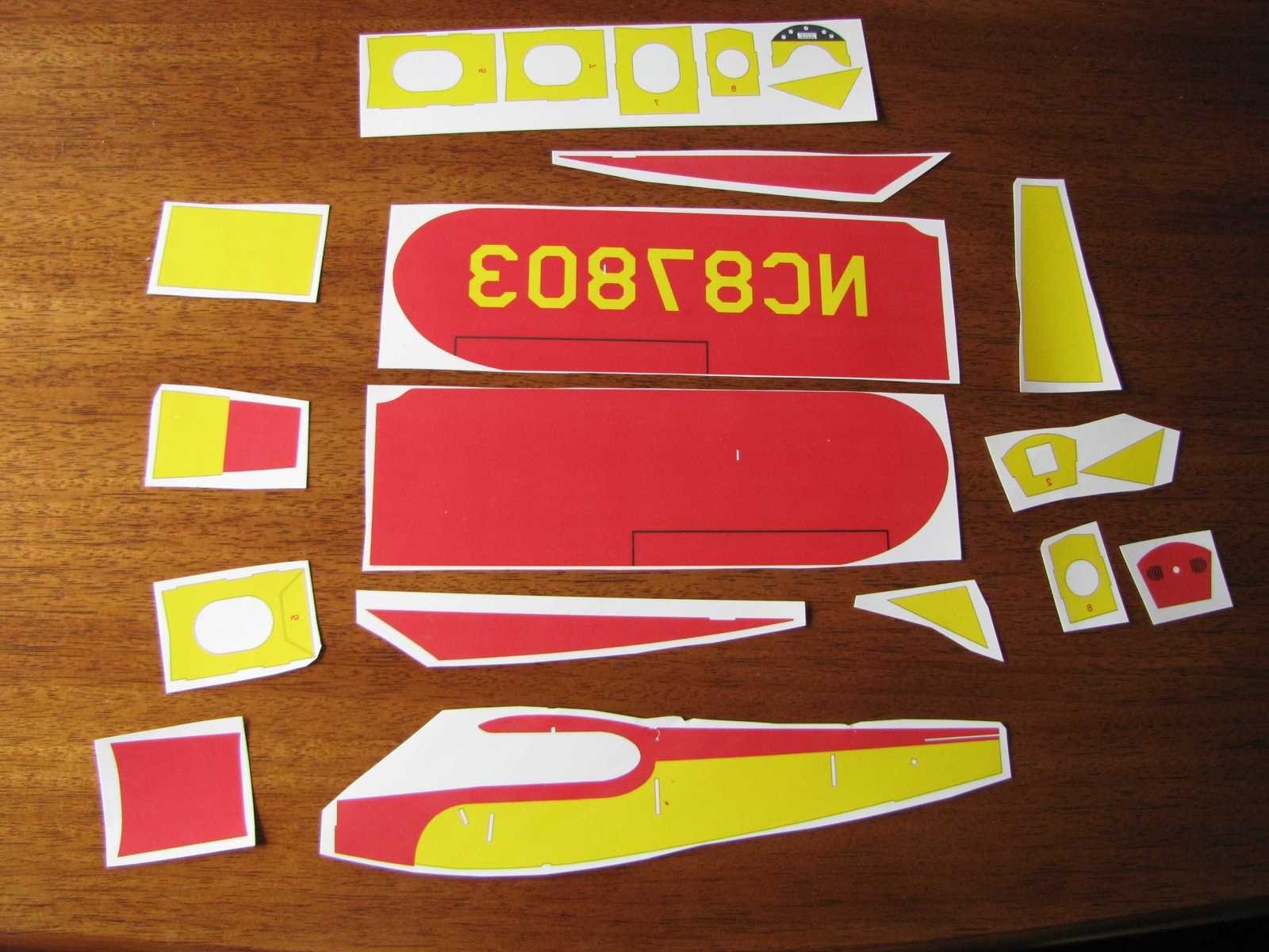 Depending on how you laid out your artwork to fit a letter size sheet, it may be necessary to cut the individual parts from the printed transfer paper. The parts do not need to be cut on the lines, just separated from the sheet of paper. If you had to break a part into sections, the sections can now be tapped together in preparation for transfer to the balsa sheet.