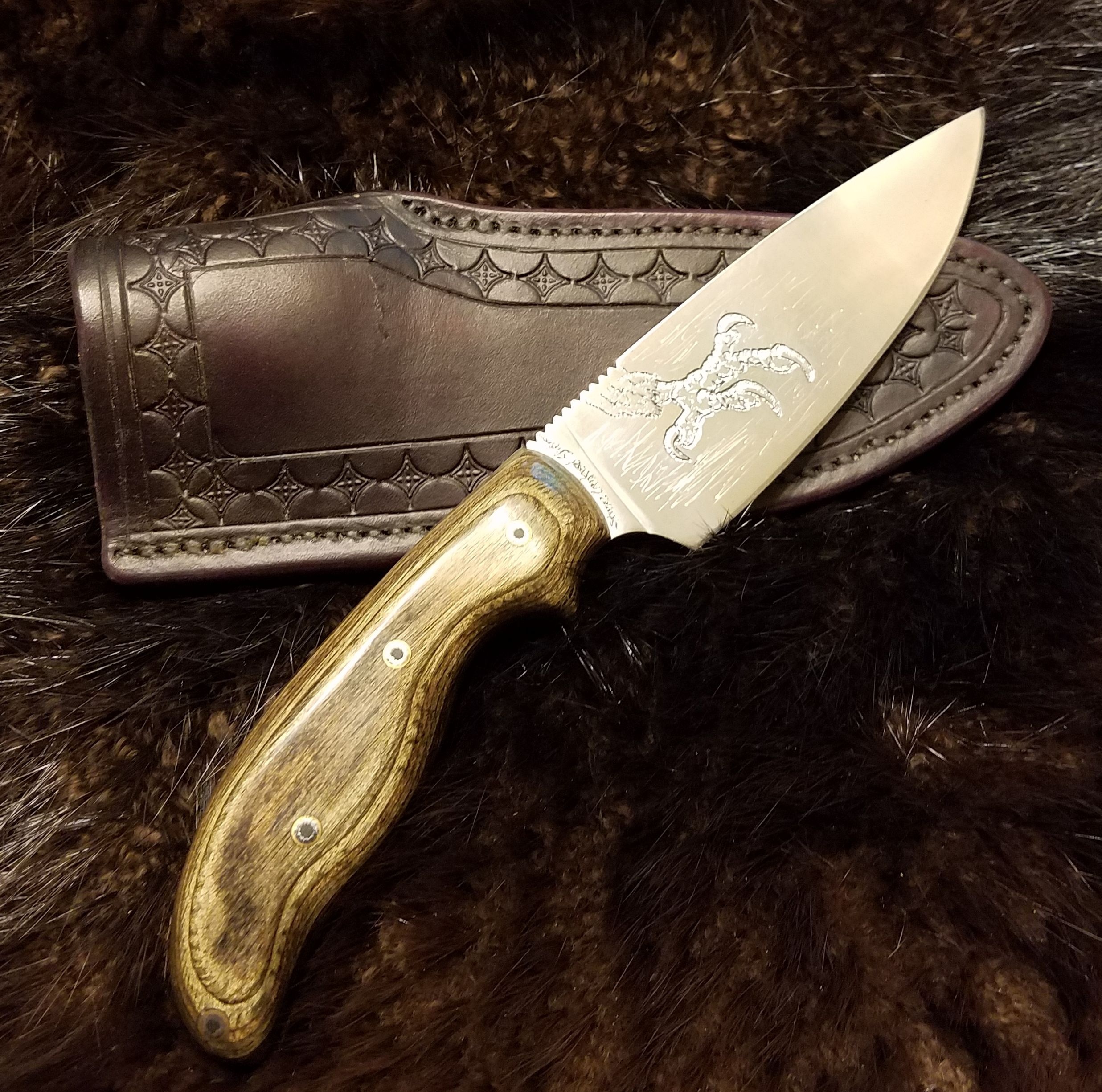 Eagle Claw Engraved Drop Point Knife with Hand Tooled, Hand Stitched Leather Sheath,   $180.00