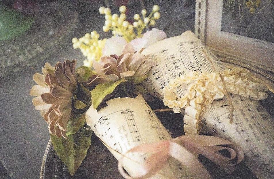 Flowers Wrapped in Music Sheet