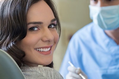 Smiling Woman at Dentist