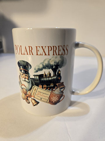 15oz ceramic mug featuring a polar express design