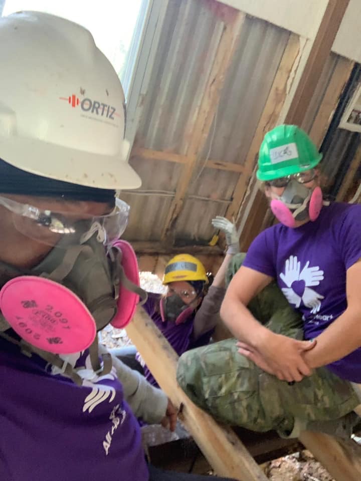 DRA volunteers taking a break from a hard of work