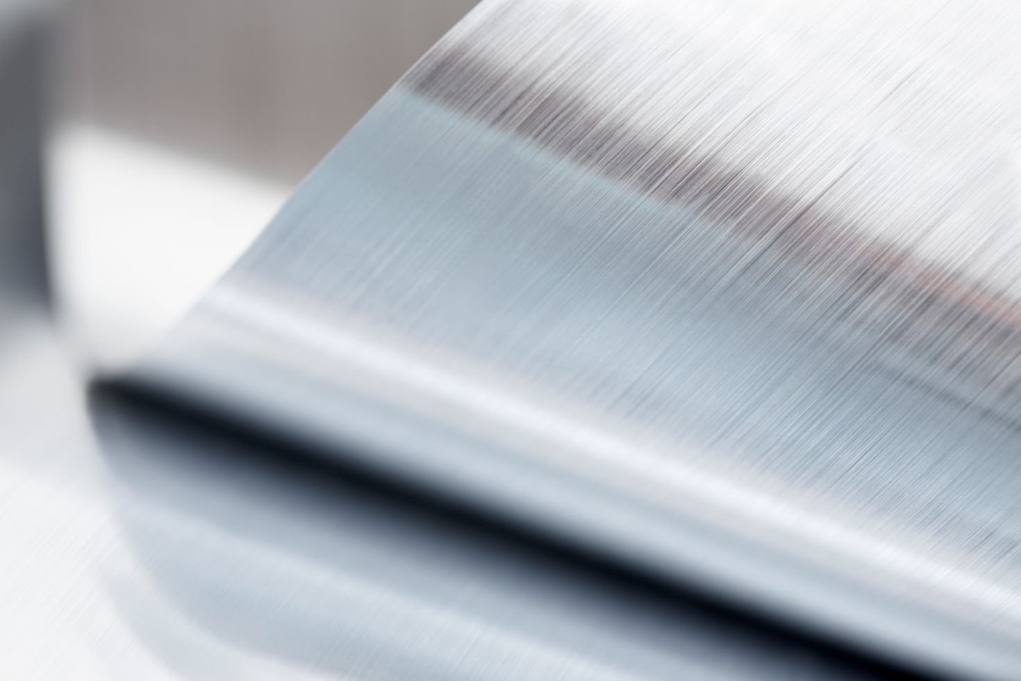 Close-up of a metallic sheet that is rolled up
