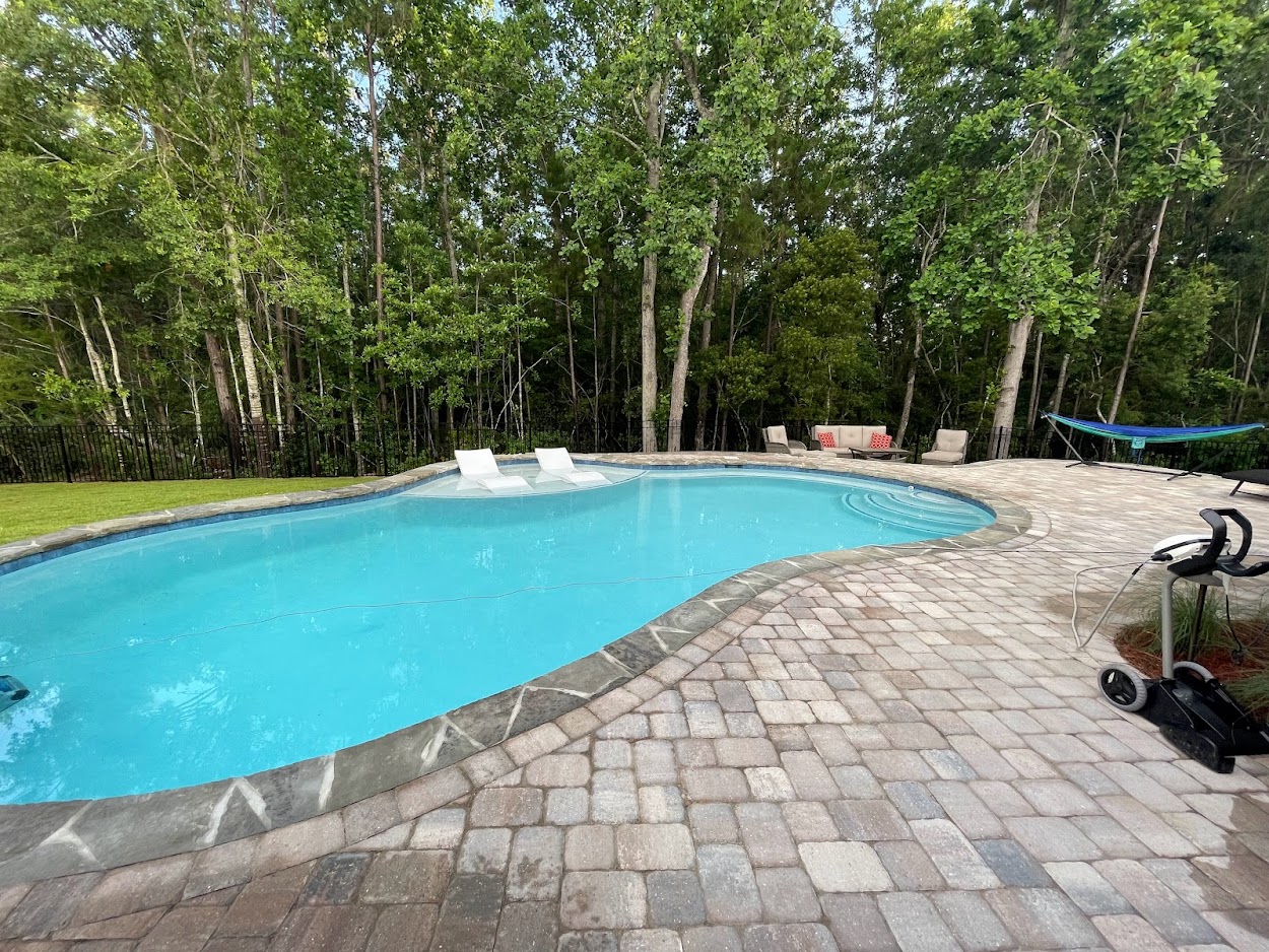 napoli pavers with gray flagstone gunite pool
