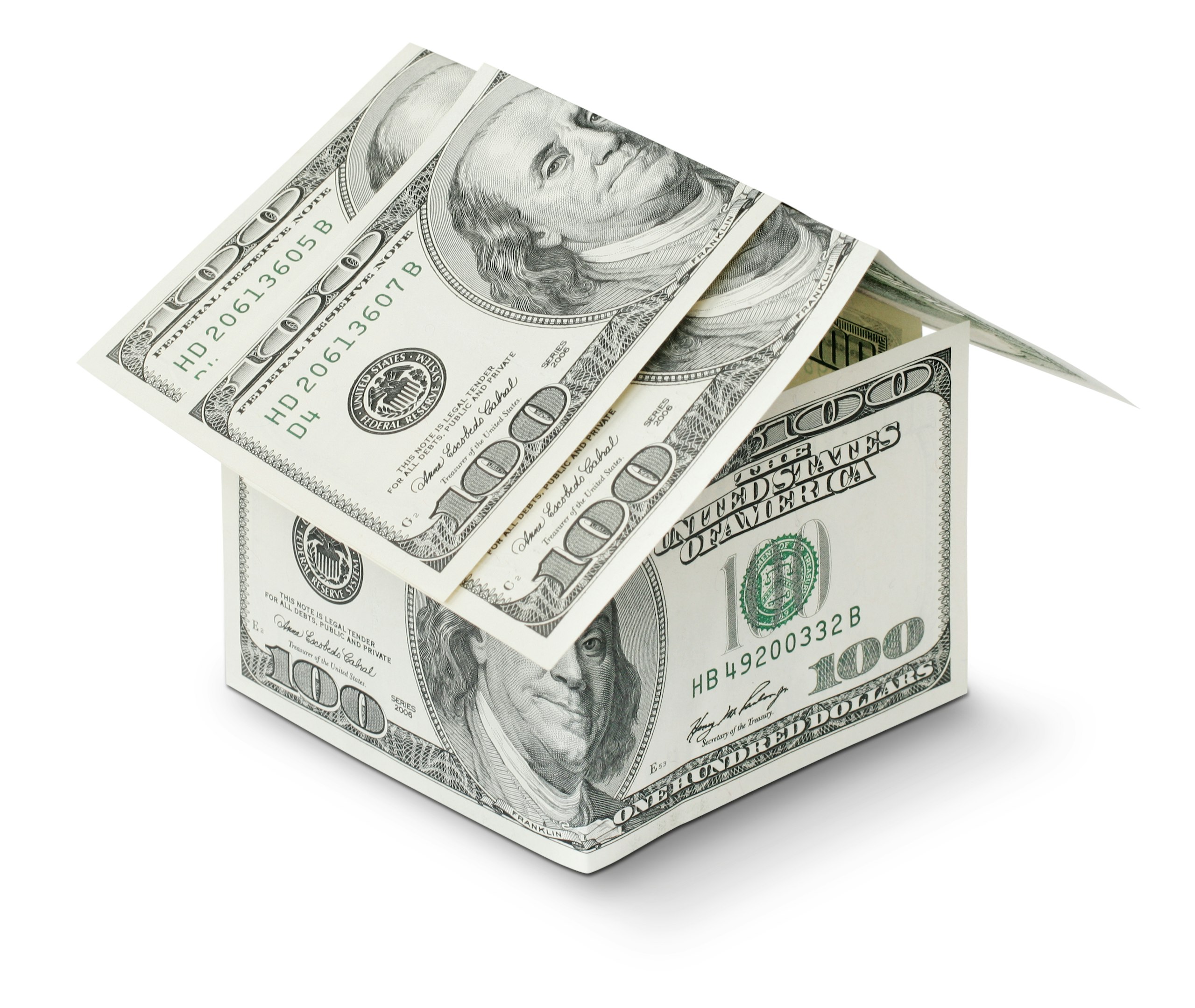 una casa hecha de dinero sobre un fondo blanco