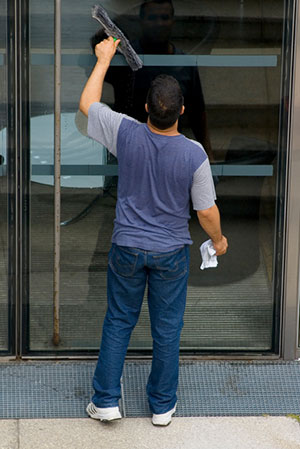 Man cleaning the window