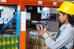 Woman Holding a Barcode Reader