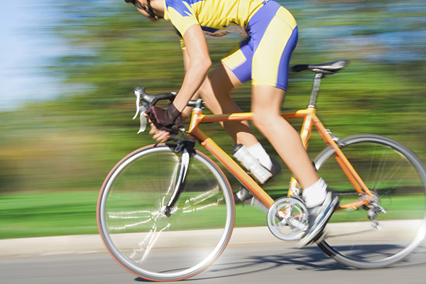 Man cycling on road Man cycling on road