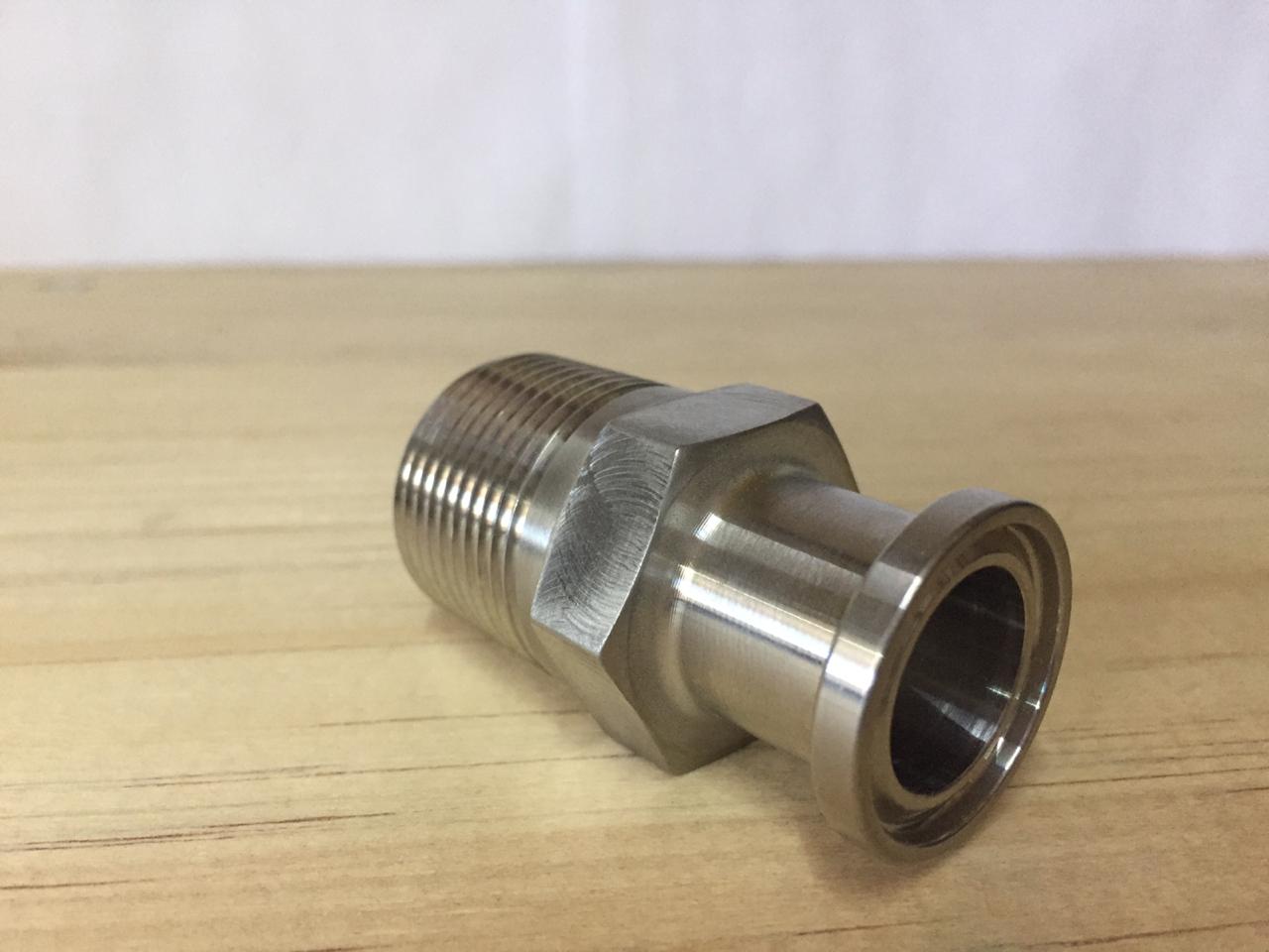 Young girl with shorts and a  vest on the beach
