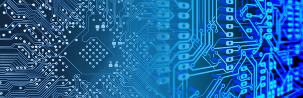Blue digital circuit board background with electronic pathways and technology pattern