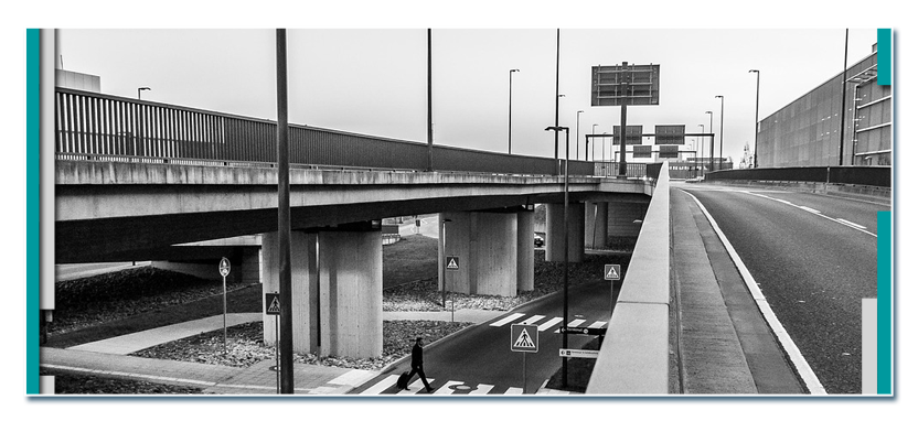 A black and white phptp of a highway