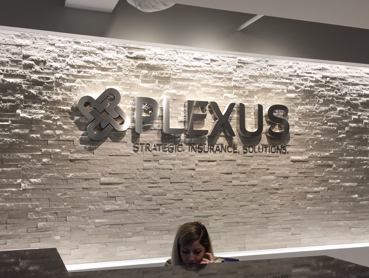 Stainless steel letters & logo reading Plexus Strategic  Insurance Solutions