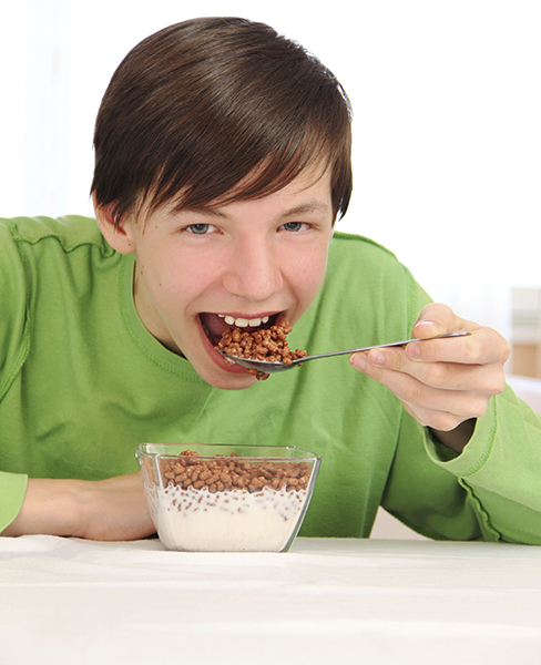 Boy eating healthy food