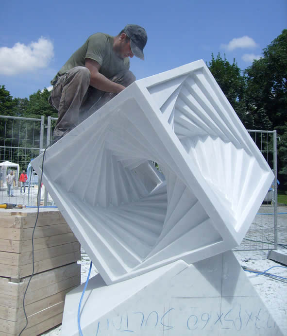 https://0201.nccdn.net/4_2/000/000/061/438/03-radoslav-sultov-carving-the-spiral-cube-sculpture-opole-2008_.jpg