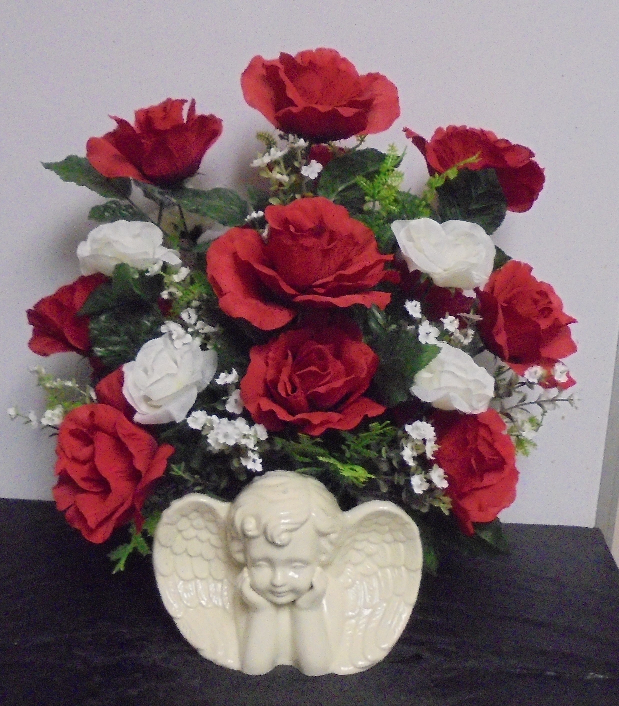(39) "Silk" Angel Arrangement
(Red & White Mix)
$60.00