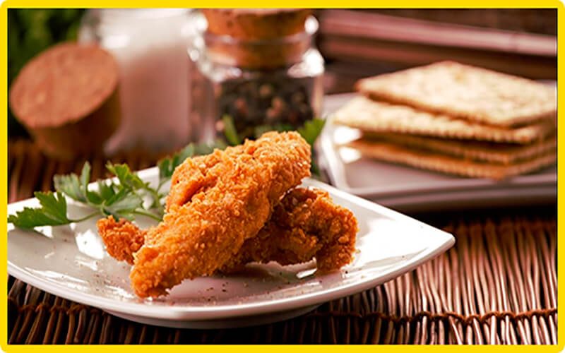 Happy chef in kitchen