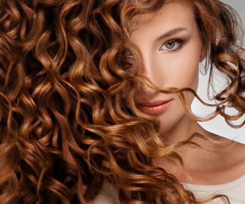 Woman with long curly hair